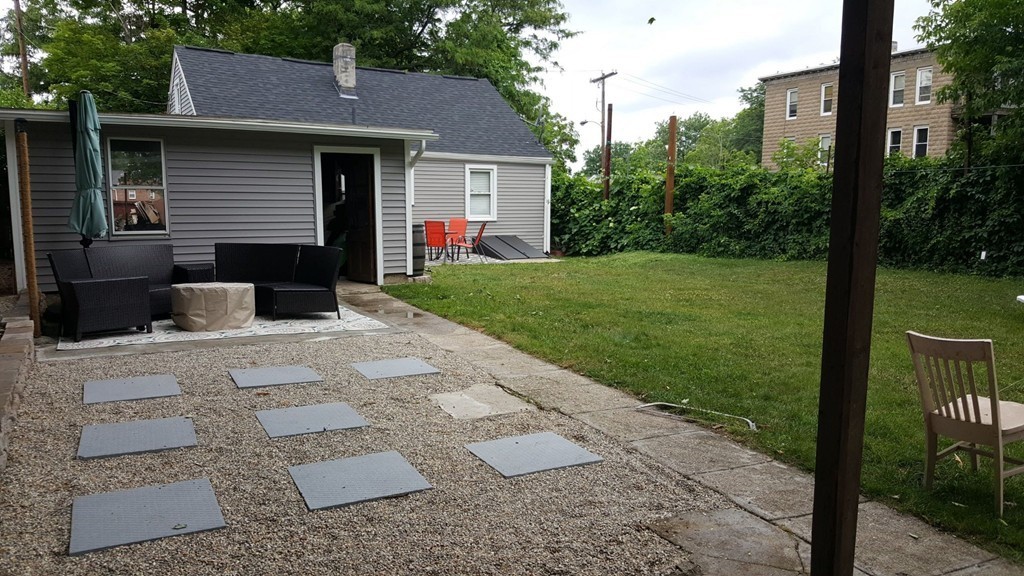47 Healey Street Springfield, MA 01151 - Photo 1 of 22 a front view of a house with garden
