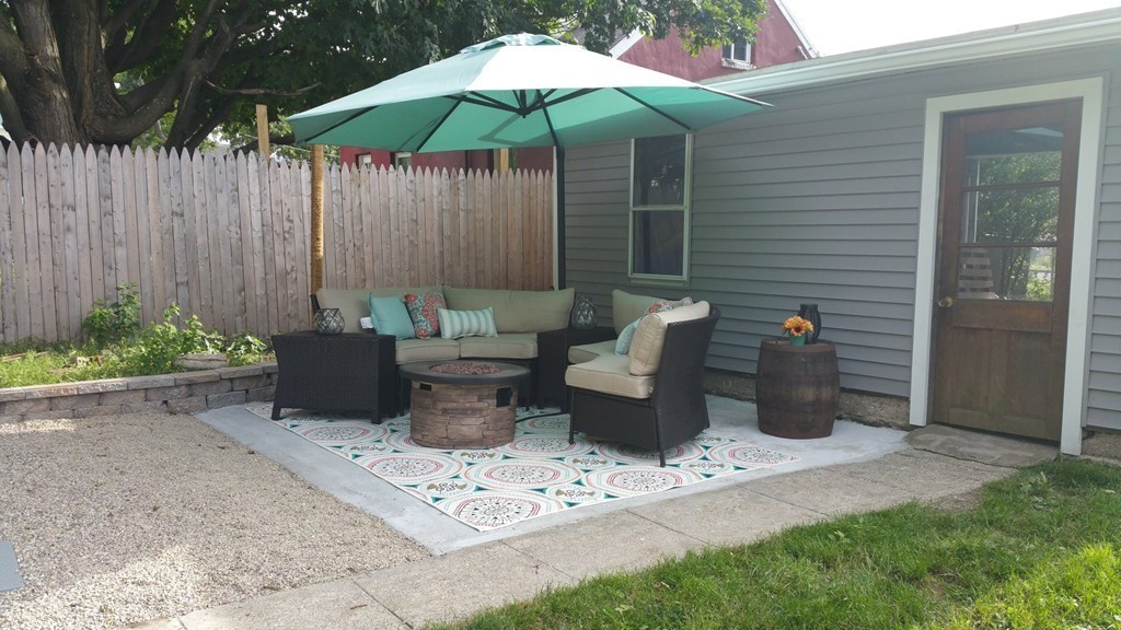 47 Healey Street Springfield, MA 01151 - Photo 15 of 22 a view of a patio with chairs and potted plants