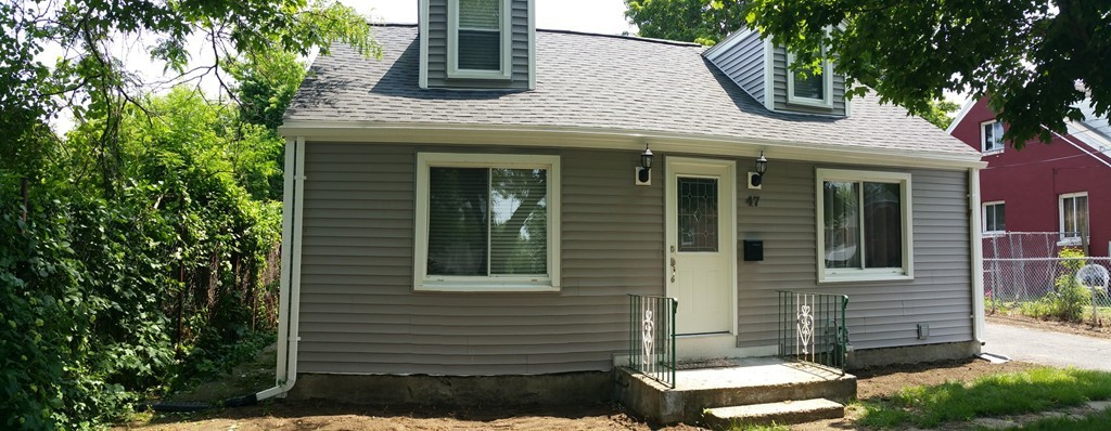 47 Healey Street Springfield, MA 01151 - Photo 22 of 22 a view of a brick house with a large windows