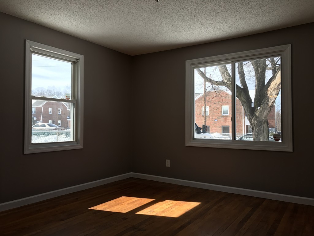 47 Healey Street Springfield, MA 01151 - Photo 5 of 22 a view of empty room with window