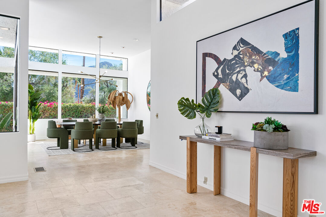 70551 Placerville Road Rancho Mirage, CA 92270 - Photo 11 of 42 a dining room filled with furniture and window