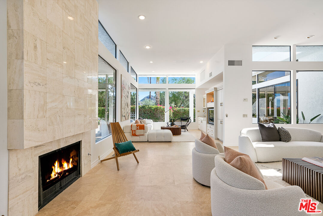 70551 Placerville Road Rancho Mirage, CA 92270 - Photo 6 of 42 a living room with furniture and a fireplace