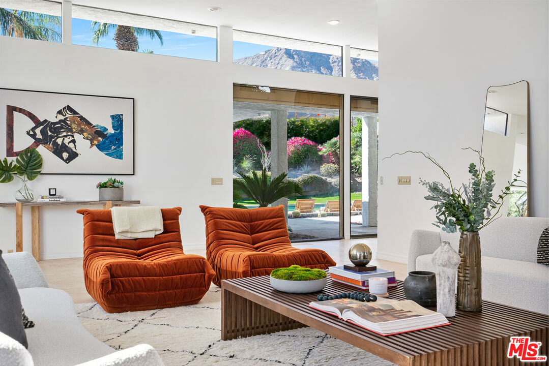 70551 Placerville Road Rancho Mirage, CA 92270 - Photo 10 of 42 a living room with furniture and a large window