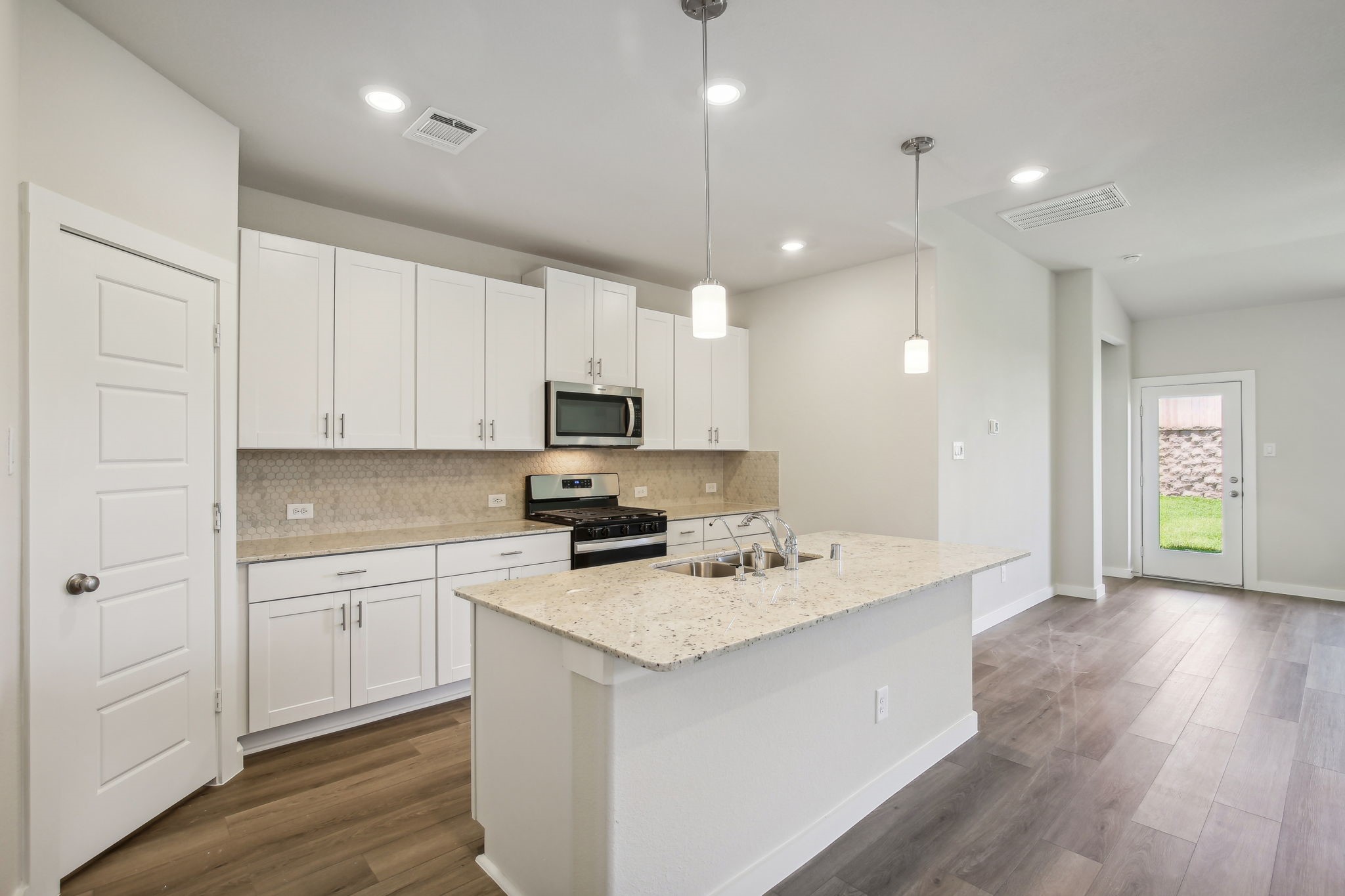 8303 Rio Spring Drive Baytown, TX 77523 - Photo 3 of 17 Photo is not of the actual home, but is an inspirational photo of builder’s model home and may depict options, furnishings, and/or decorator features that are not included