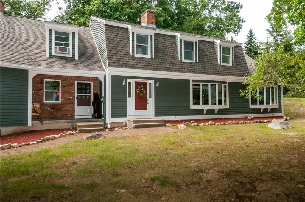 38 Wilson Pond Road Harwinton, CT 06791 - Photo 1 of 1 a view of a house with backyard sitting area and porch
