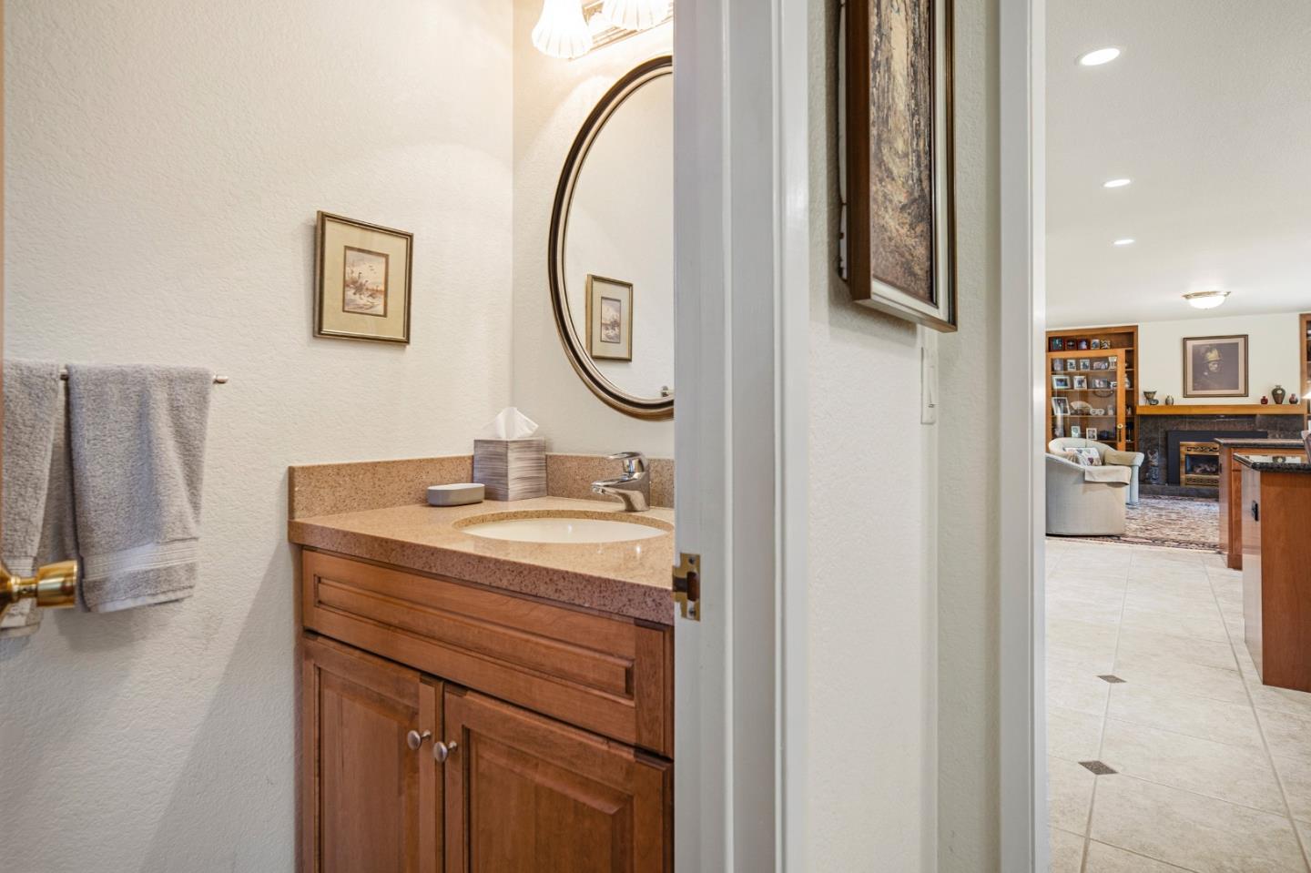 2911 Colton Road Pebble Beach, CA 93953 - Photo 23 of 46 a en suite bathroom with a sink and a mirror
