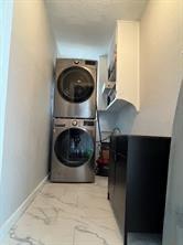 356 Shoreline Drive Azle, TX 76020 - Photo 12 of 22 a view of a hallway with a washer and dryer