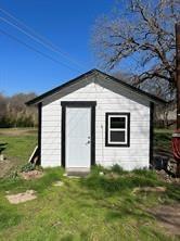 356 Shoreline Drive Azle, TX 76020 - Photo 14 of 22 a front view of a house with a yard