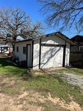 356 Shoreline Drive Azle, TX 76020 - Photo 17 of 22 a house with a yard