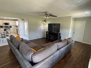 356 Shoreline Drive Azle, TX 76020 - Photo 3 of 22 a living room with furniture and a flat screen tv