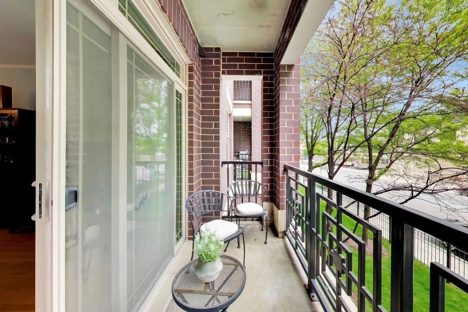 6436 Roosevelt Road, Unit 212 Oak Park, IL 60304 - Photo 11 of 22 a view of porch with furniture