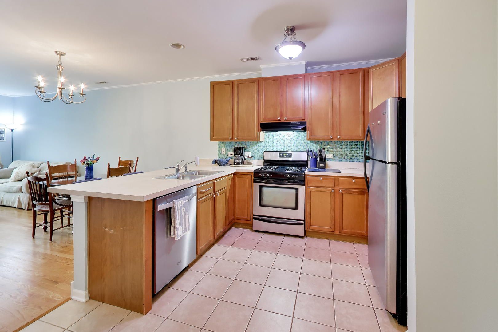6436 Roosevelt Road, Unit 212 Oak Park, IL 60304 - Photo 7 of 22 a kitchen with a sink appliances and cabinets