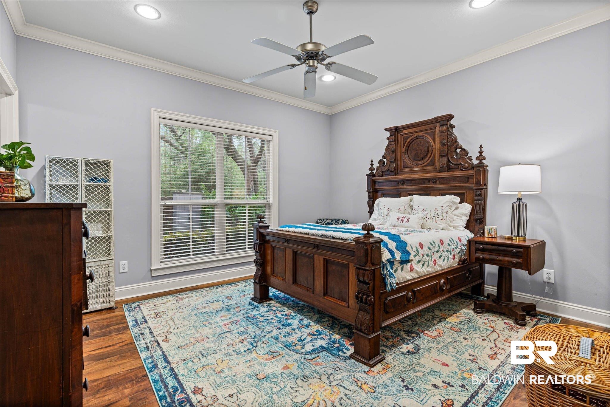 9916 Windmill Road, Unit 14 Fairhope, AL 36532 - Photo 6 of 12 Bedroom featuring crown molding, ceiling fan, recessed lighting, and wood finished floors