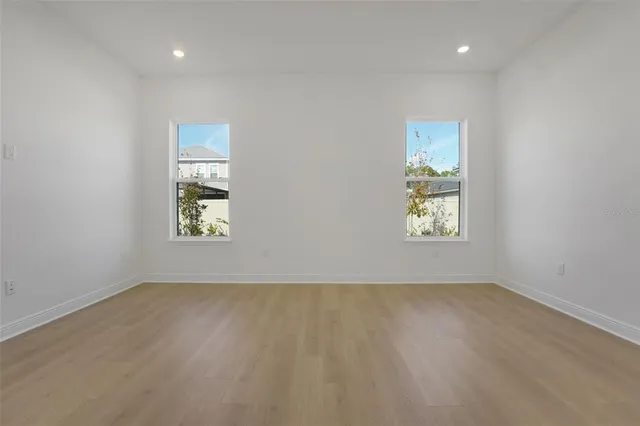 an empty room with windows