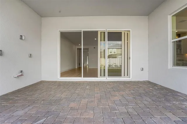 a view of an empty room with window