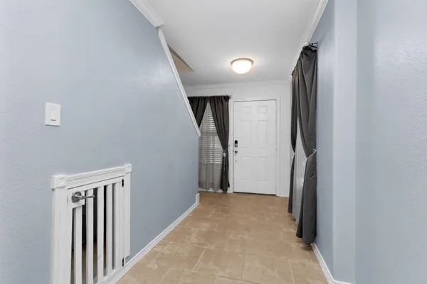 a view of hallway with stairs