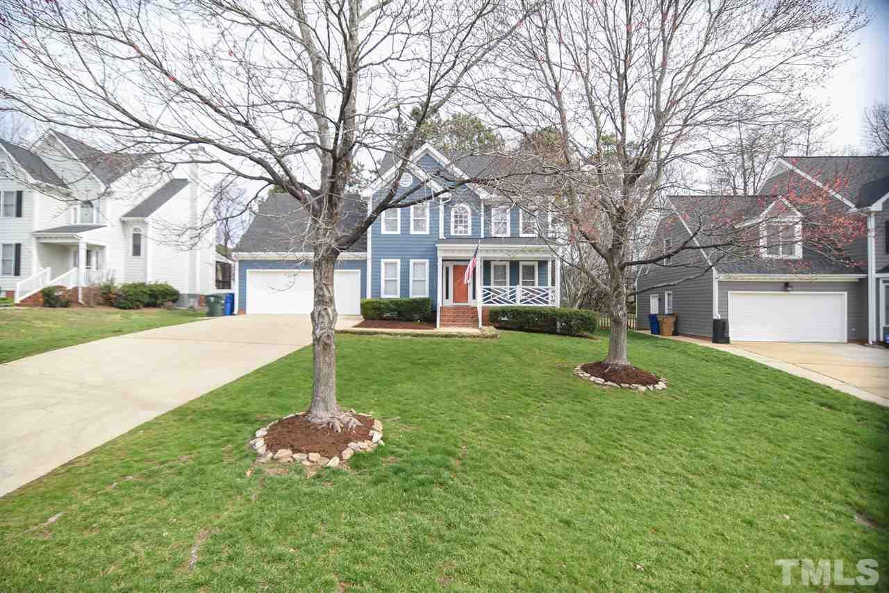 9200 Dawnshire Road Raleigh, NC 27615 - Photo 2 of 30 a front view of a house with a yard and trees