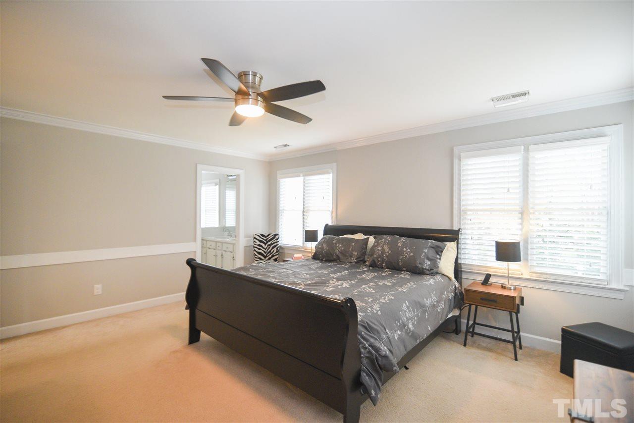 9200 Dawnshire Road Raleigh, NC 27615 - Photo 19 of 30 a bedroom with a bed and a window