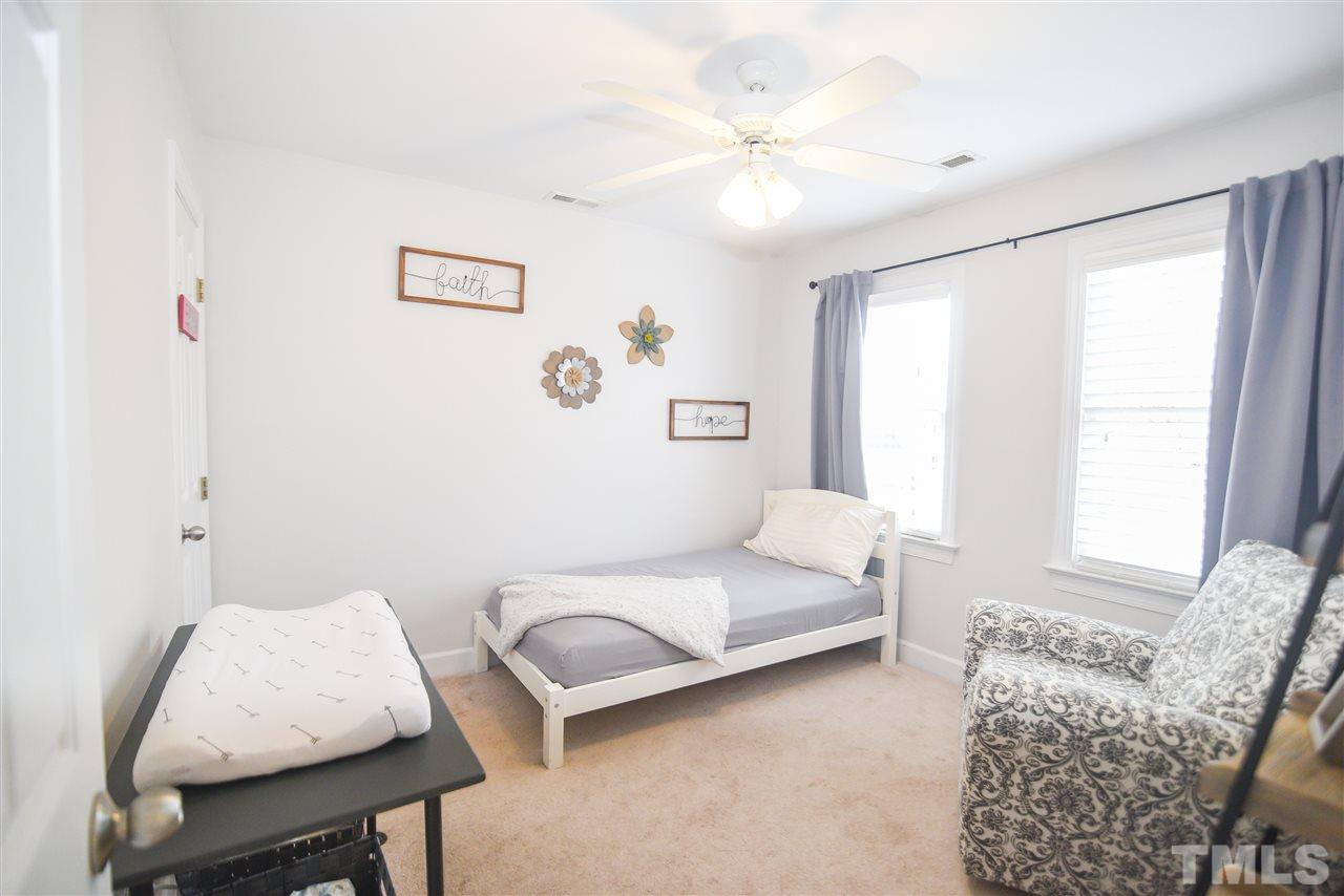 9200 Dawnshire Road Raleigh, NC 27615 - Photo 24 of 30 a living room with furniture and a window