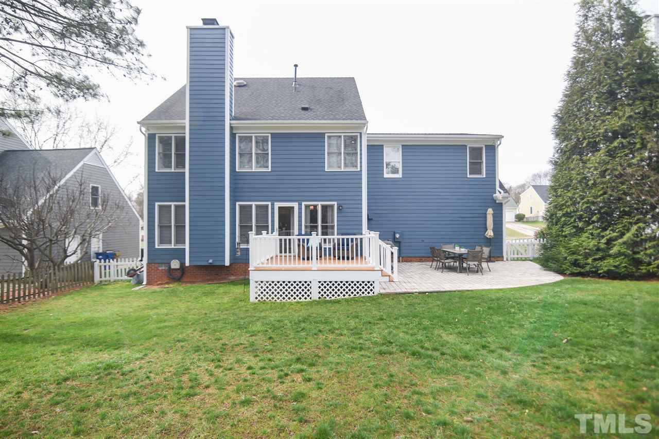 9200 Dawnshire Road Raleigh, NC 27615 - Photo 27 of 30 a view of a house with a yard and sitting area