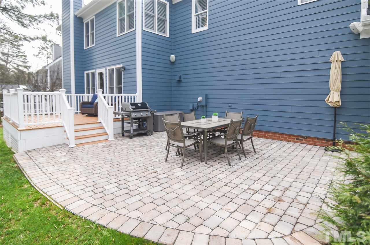 9200 Dawnshire Road Raleigh, NC 27615 - Photo 29 of 30 a view of a patio with a table and chairs