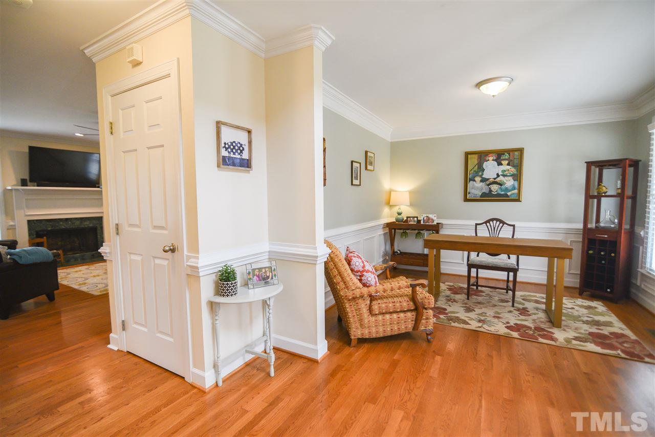 9200 Dawnshire Road Raleigh, NC 27615 - Photo 6 of 30 a living room with furniture and a wooden floor