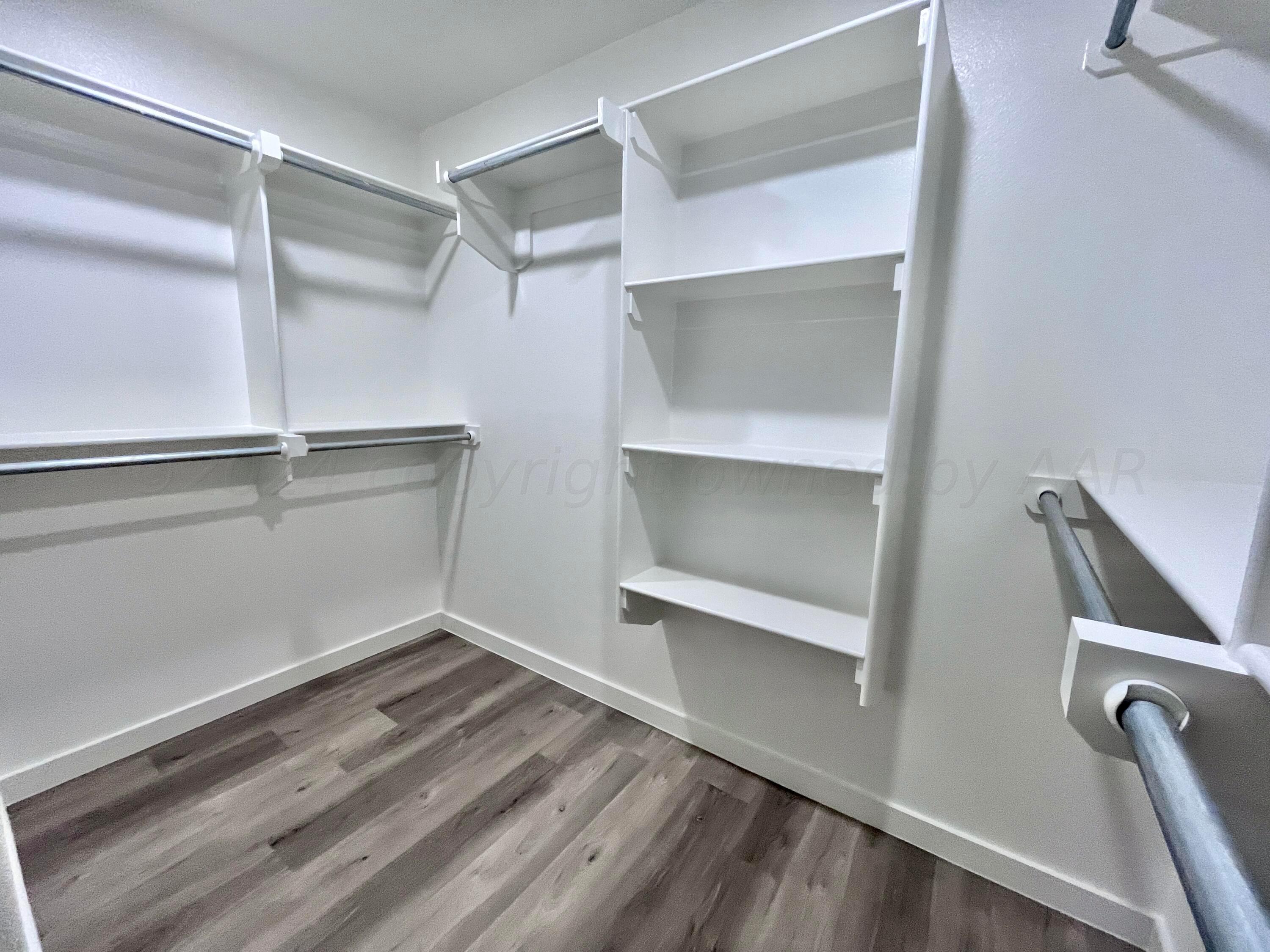 3103 Swenson Street Amarillo, TX 79124 - Photo 13 of 23 a view of an empty walk in closet