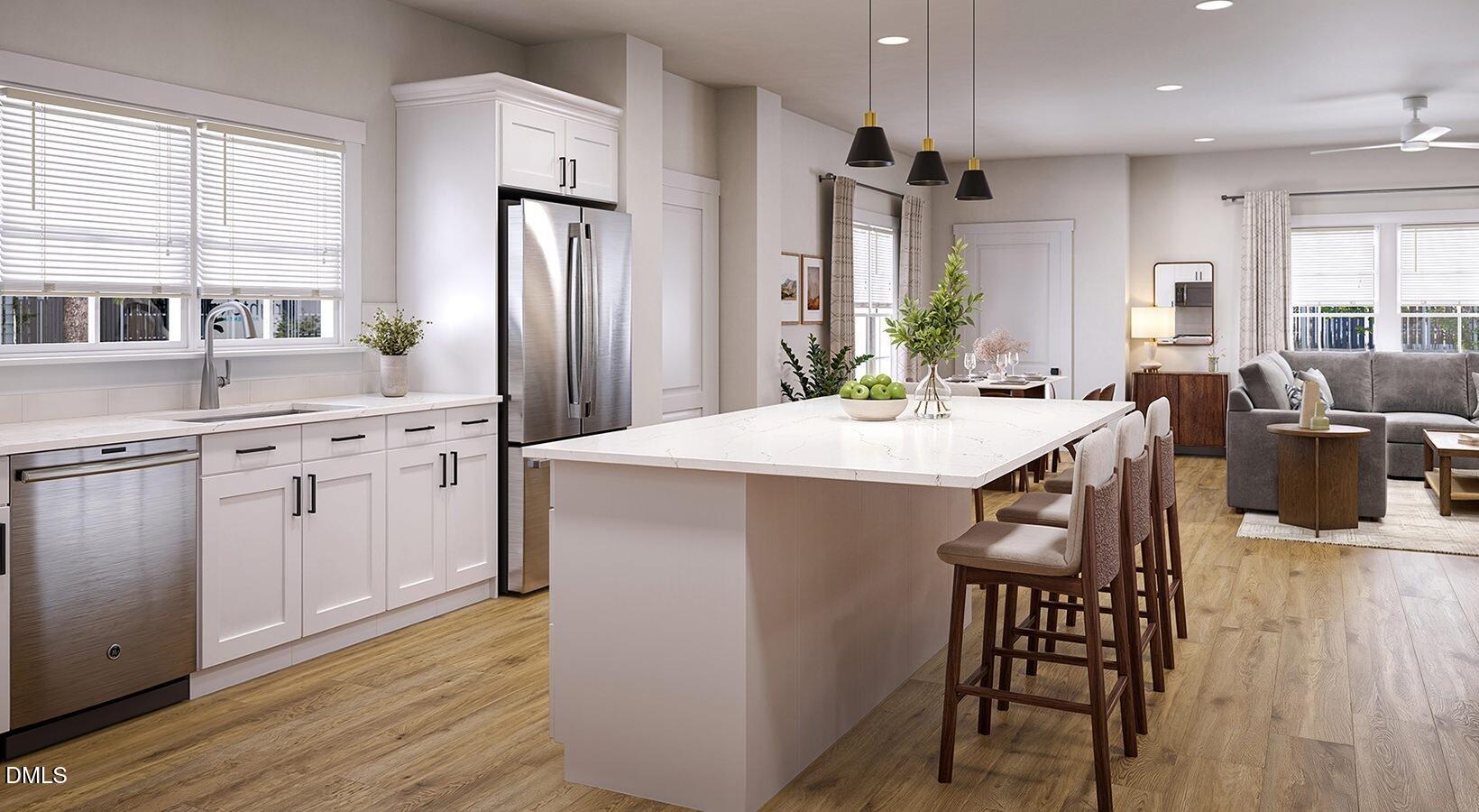 145 Burke Legacy Way, Unit ROWAN Wendell, NC 27591 - Photo 5 of 12 kitchen-c7a13a528de1a87a175a49748f7b5ca4