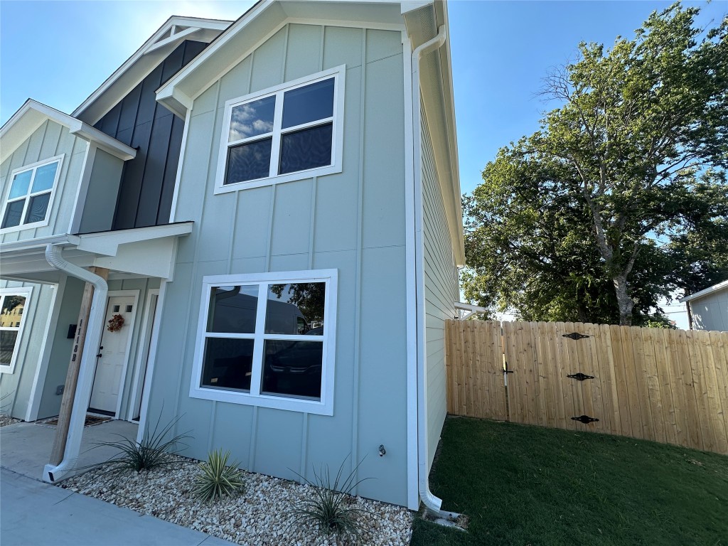 1118 South 51st Street, Unit B Temple, TX 76504 - Photo 2 of 25 a front view of a house with a yard
