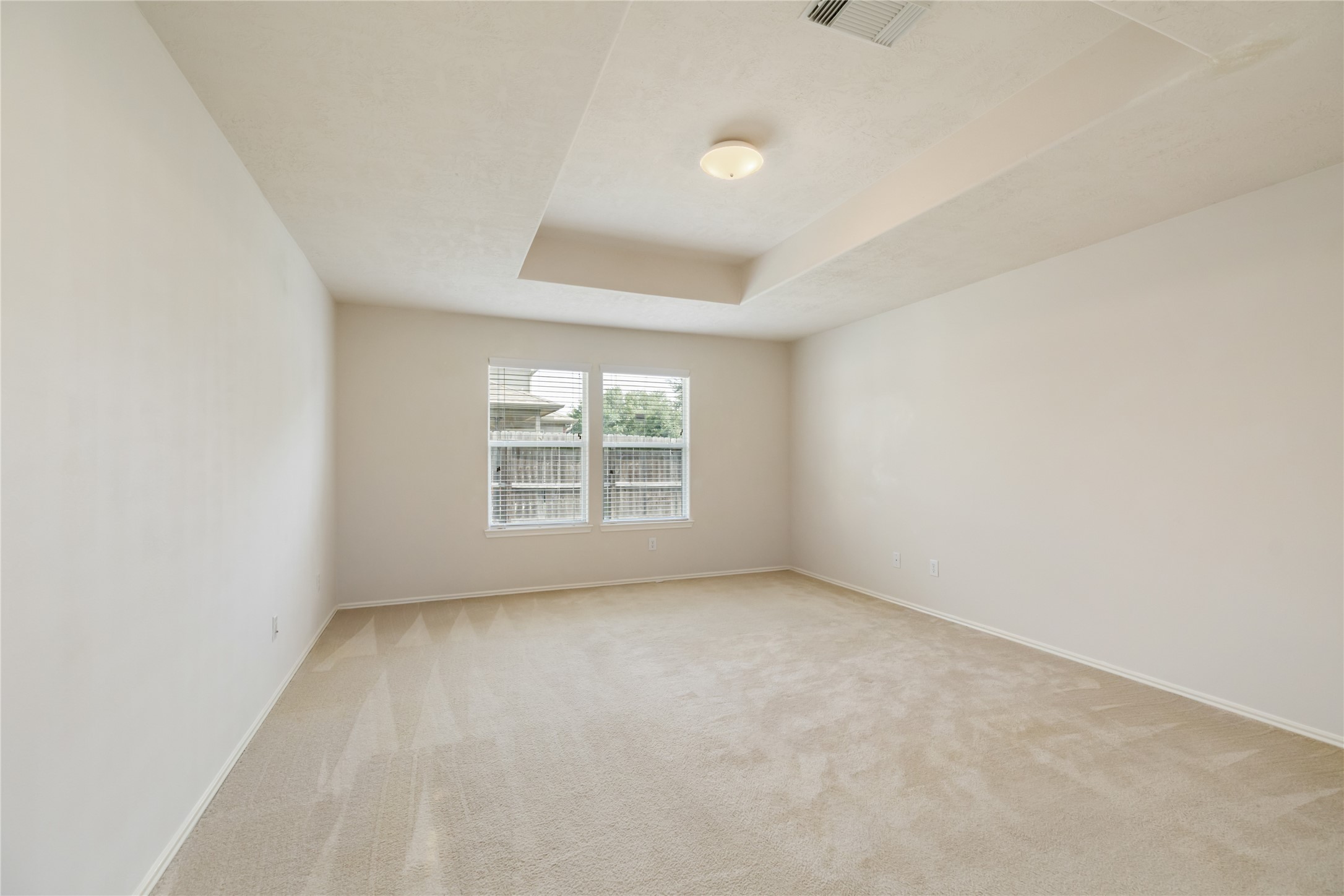 9339 Canady Park Lane Houston, TX 77075 - Photo 22 of 44 Large Downstairs Primary Bedroom with Tray Ceiling