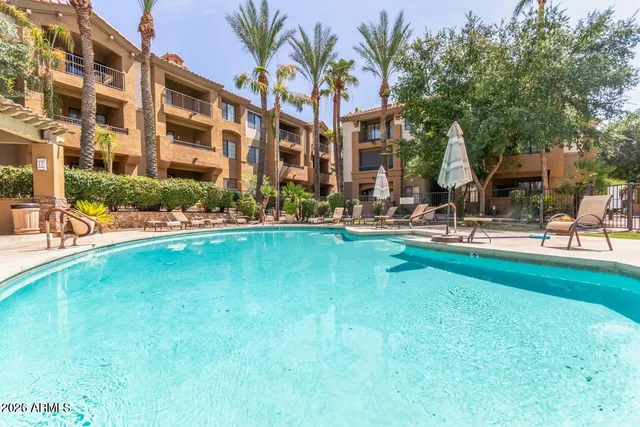 a view of a lake with a swimming pool