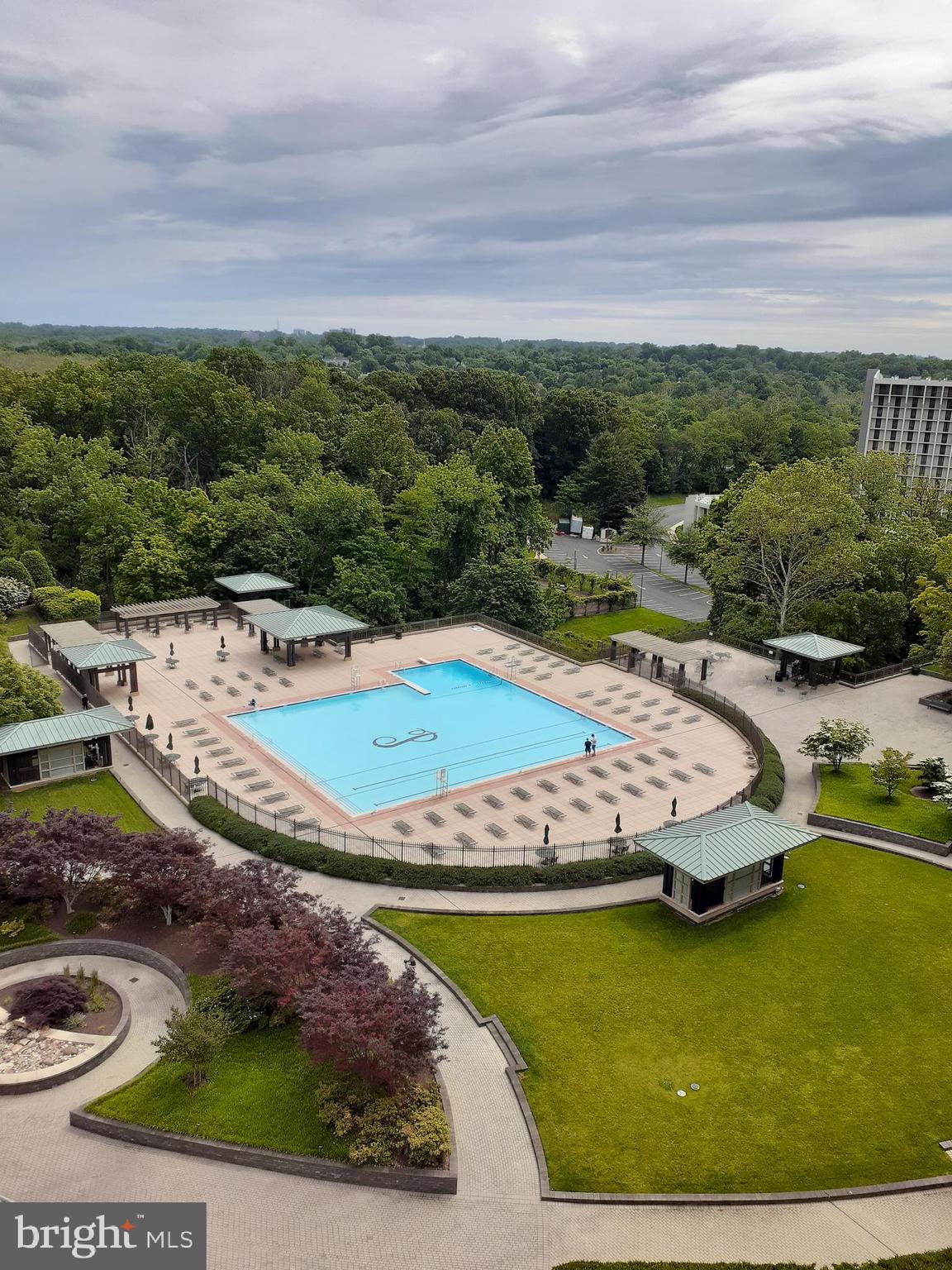 a view of a swimming pool with an outdoor space