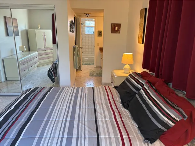 a view of a living room and bathroom