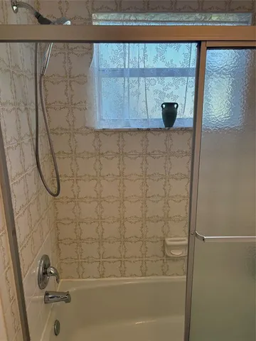 a bathroom with a toilet and a sink