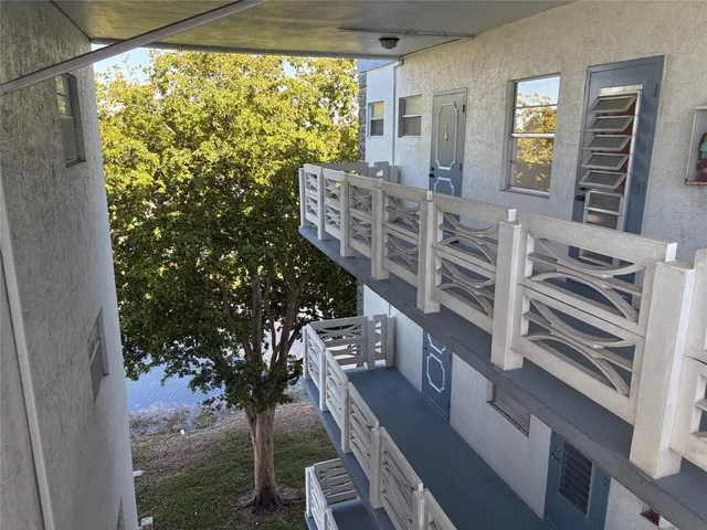 a view of a balcony with an outdoor space