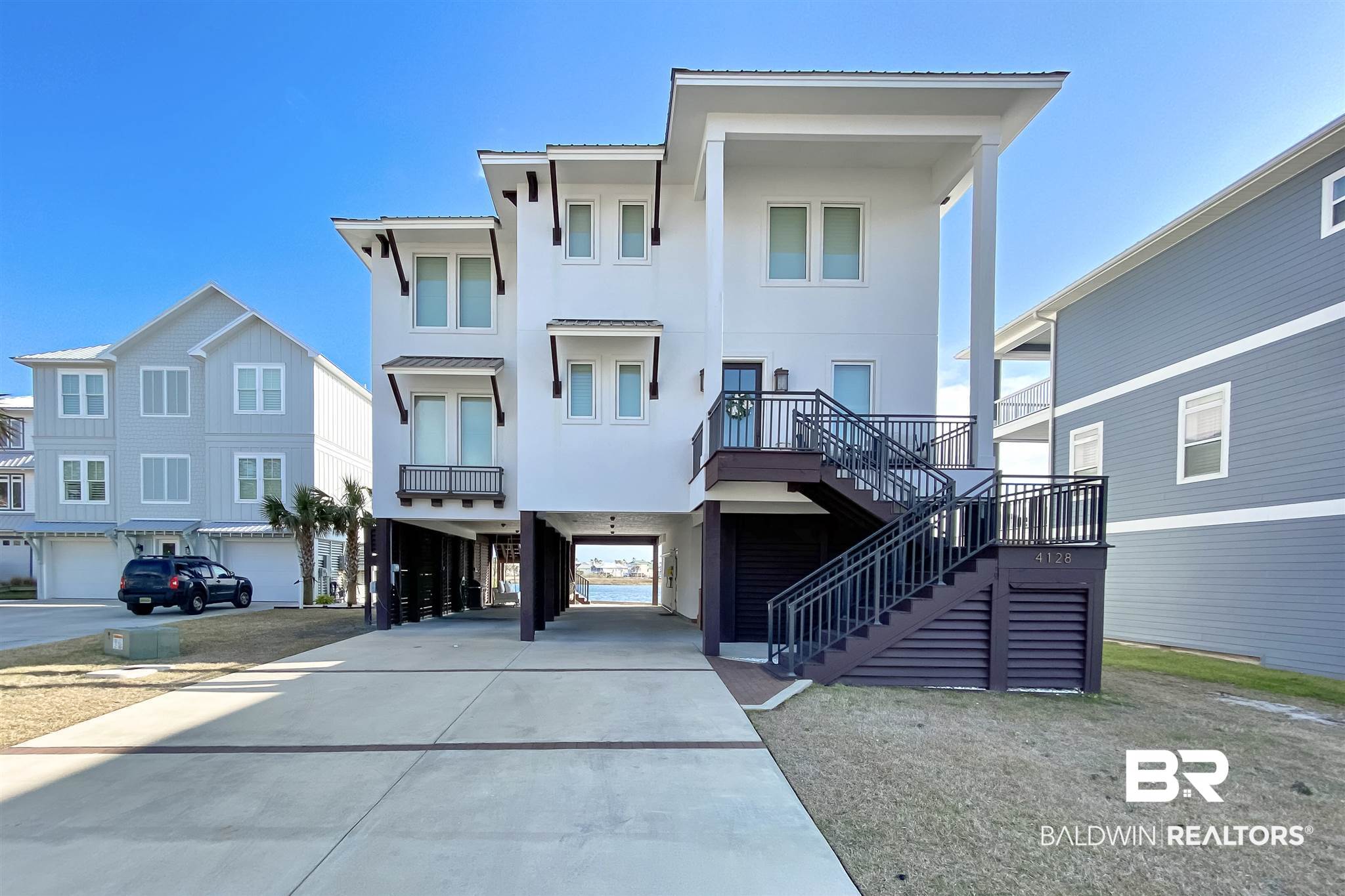 4128 Harbor Road Orange Beach, AL 36561 - Photo 1 of 45 Waterfront Gold Fortified Home in Terry Cove