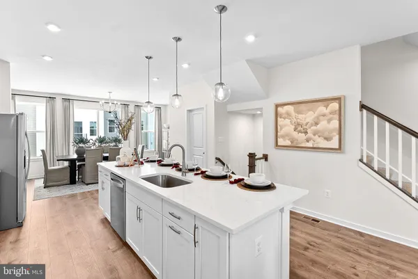 a kitchen with counter top space and a sink