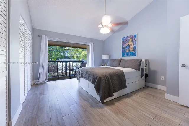 a bathroom with a sink a mirror and shower
