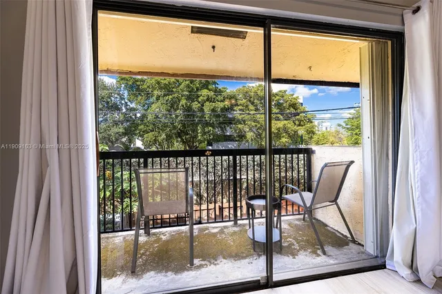 a view of a bedroom from a hallway