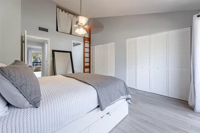 a front view of a house with parking space