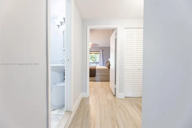 an aerial view of residential houses with outdoor space and street view