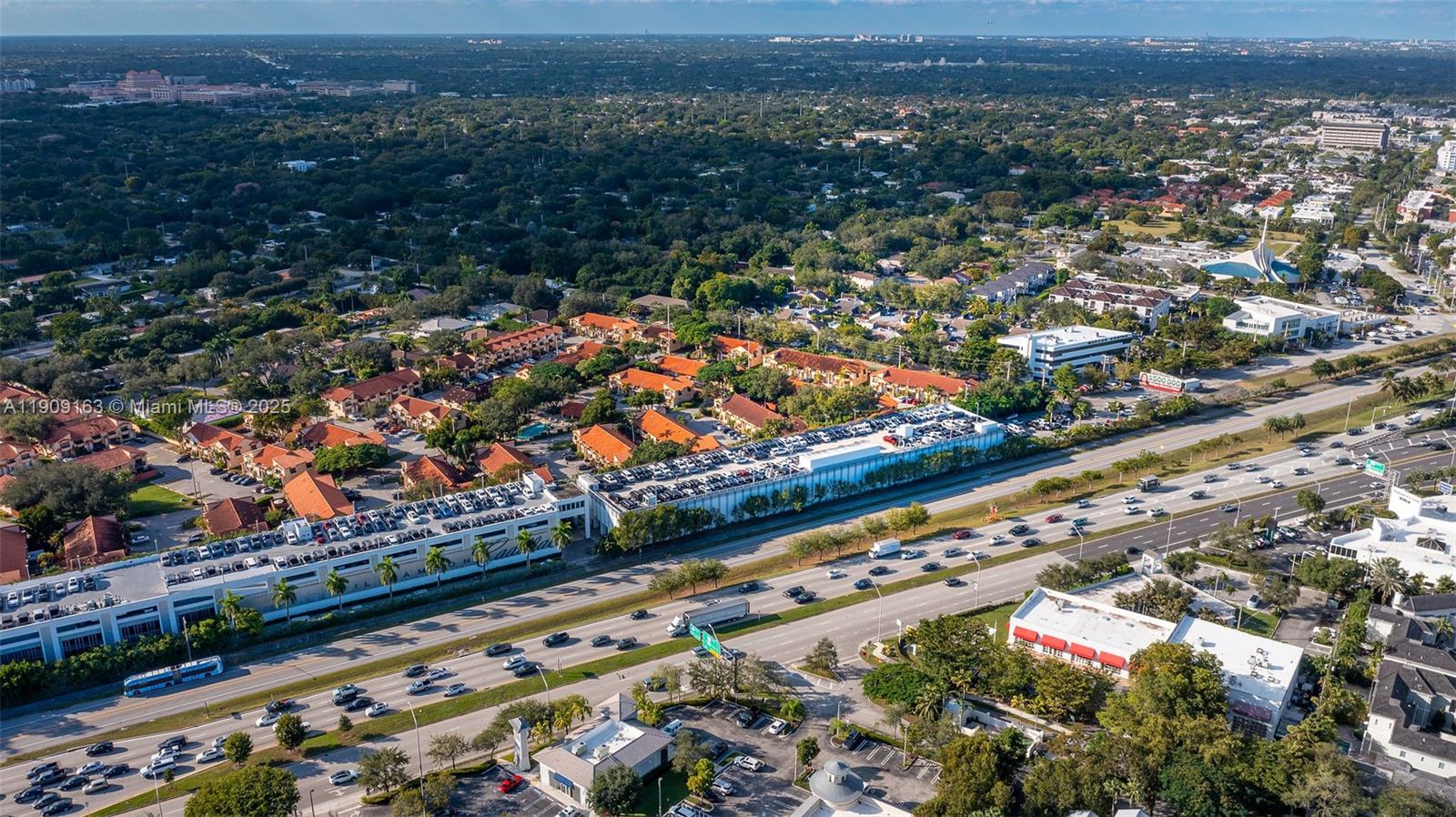 10037 Southwest 77th Court Miami, FL 33156 - Photo 47 of 70 an aerial view of residential houses with outdoor space and street view