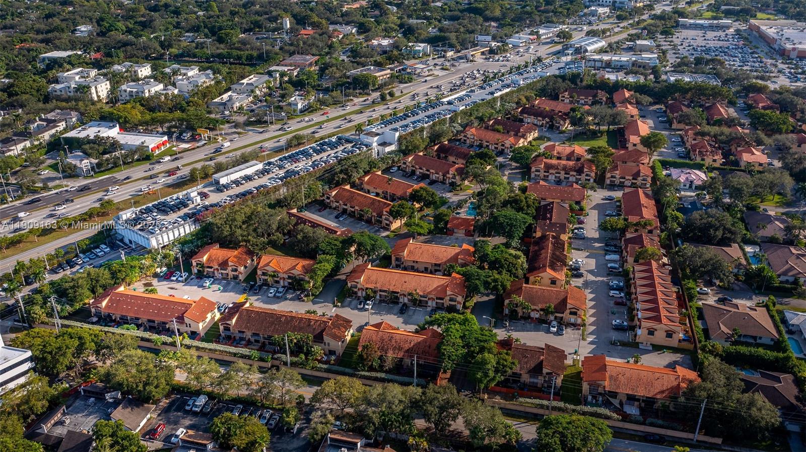 10037 Southwest 77th Court Miami, FL 33156 - Photo 53 of 70 an aerial view of residential houses with outdoor space