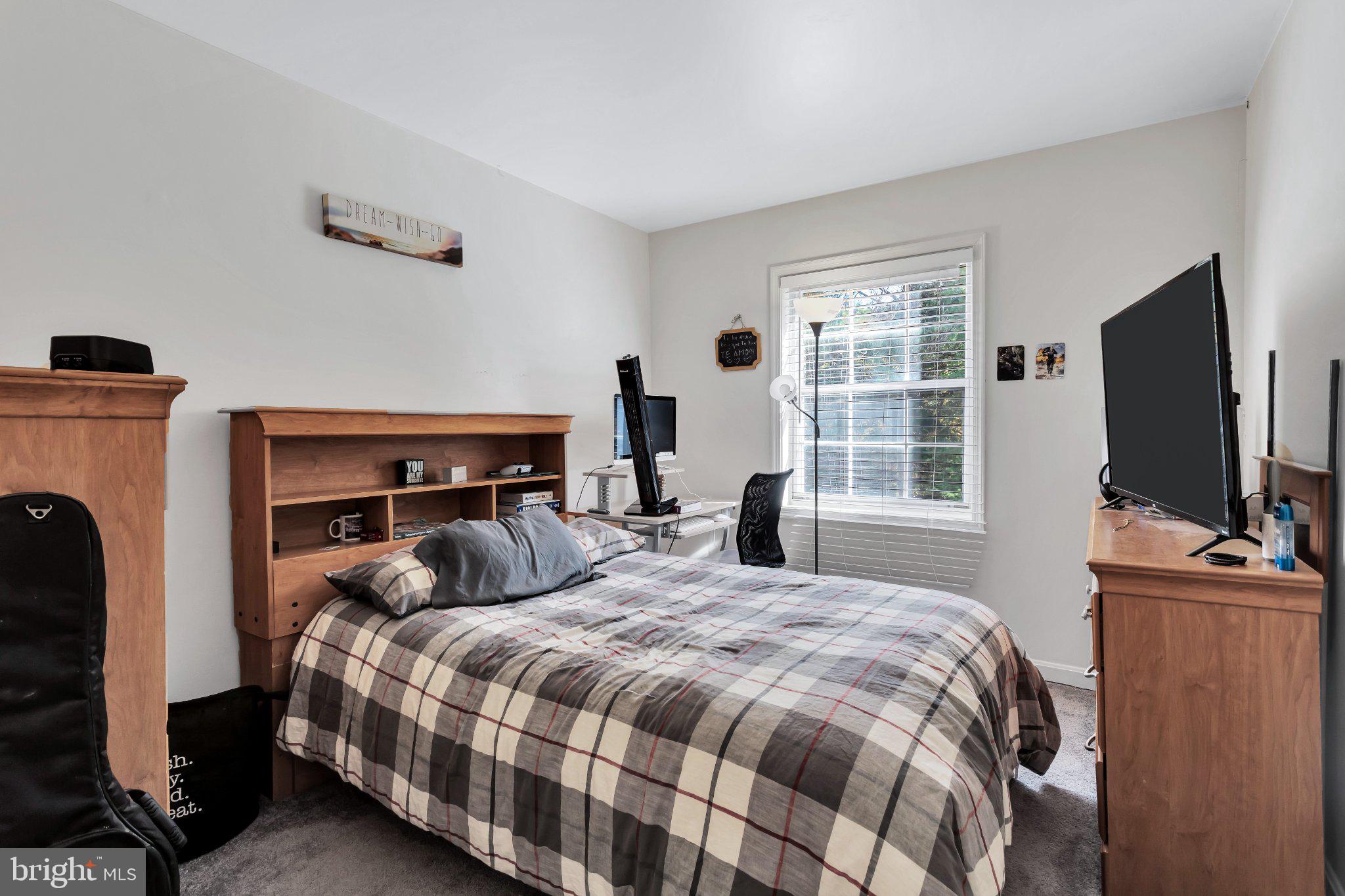 9009 Sweet Birch Court Springfield, VA 22152 - Photo 19 of 34 Cozy bedroom with natural light.