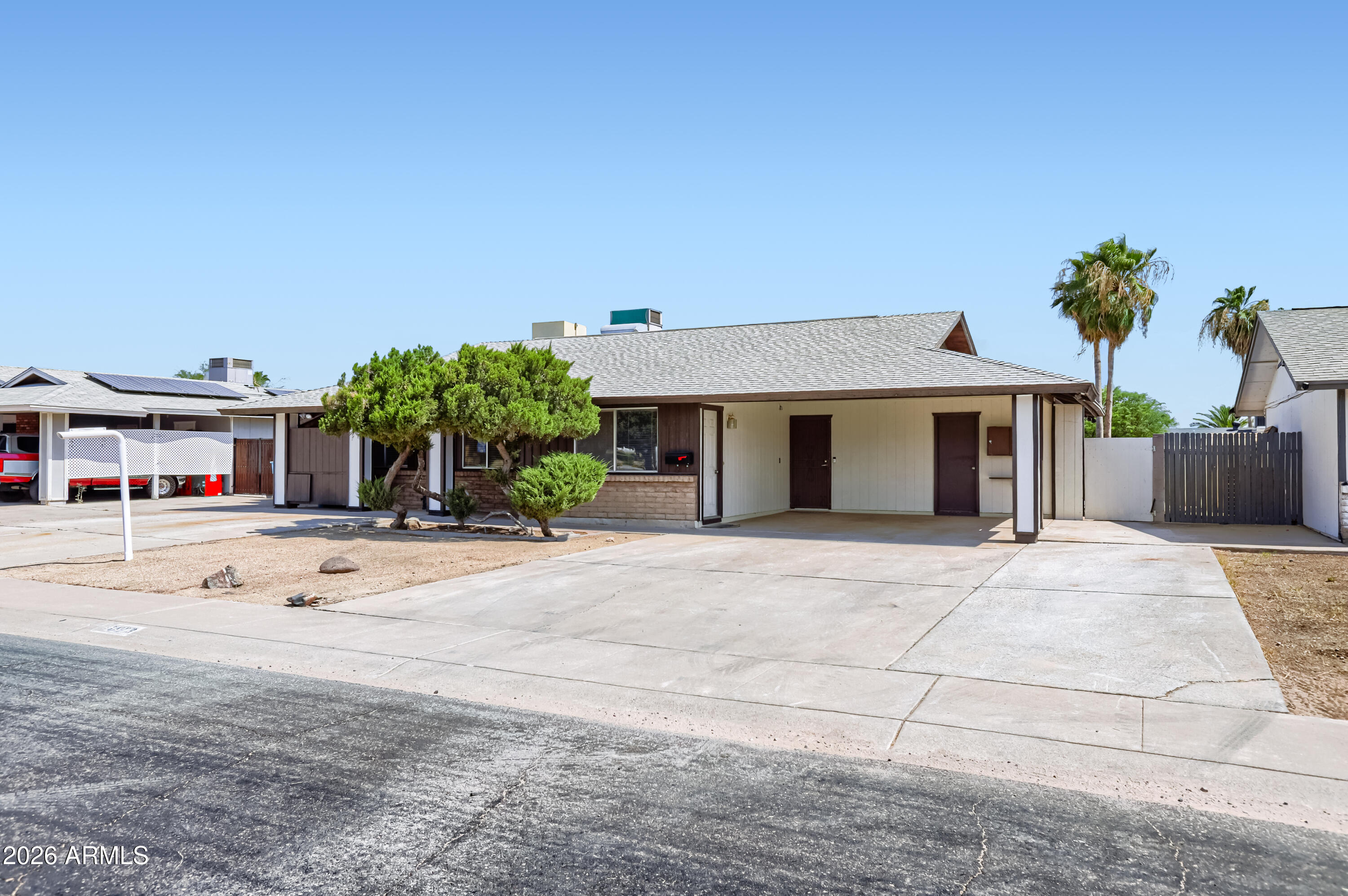 3823 West Greenway Road Phoenix, AZ 85053 - Photo 3 of 28 front view of house with a yard