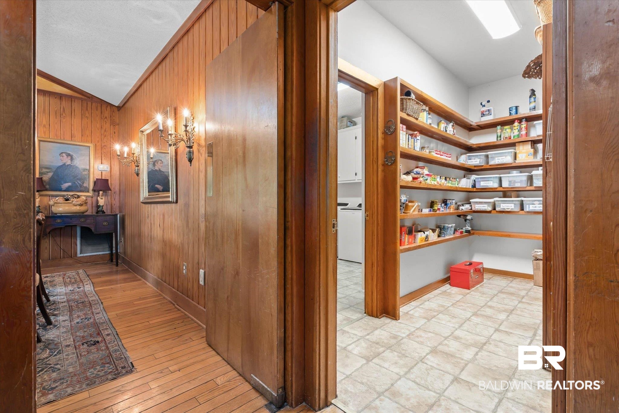 3500 Venetia Road Mobile, AL 36605 - Photo 25 of 56 Spacious pantry featuring extensive wood shelving and light-toned tile flooring
