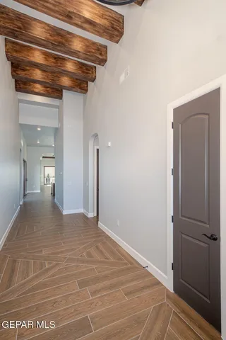 a view of a livingroom with furniture window and wooden floor