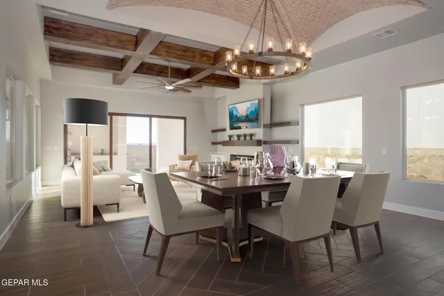 a kitchen with stainless steel appliances granite countertop a kitchen island hardwood floor sink and stove