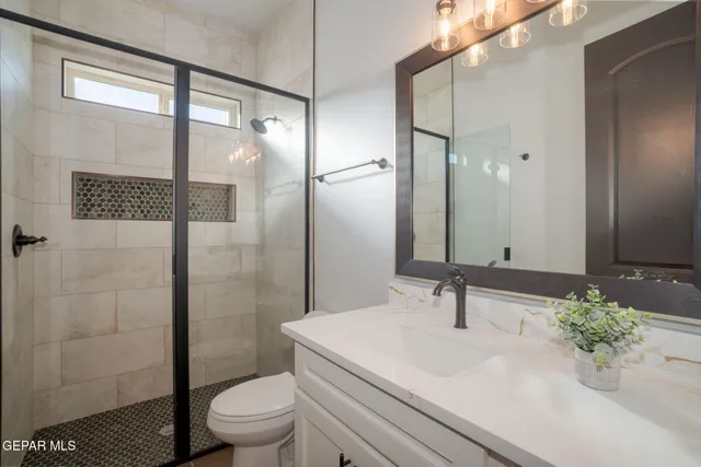 a view of a pathway with a lake view