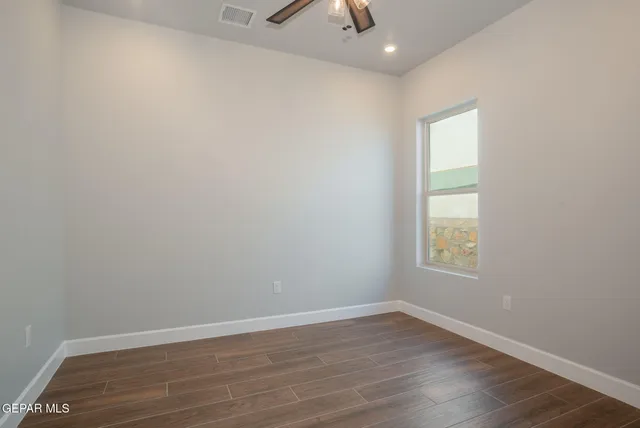 a kitchen with a stove a sink and a refrigerator
